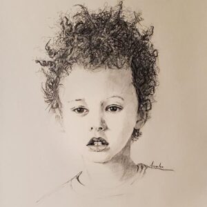 A Boy with Curly Hair